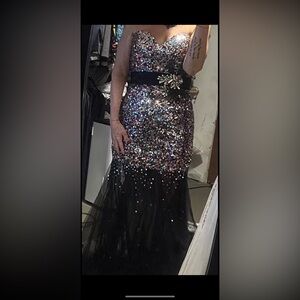 Formal mermaid style gown worn twice